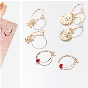 Urban Outfitters Leo zodiac earrings